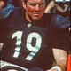 Actor Dennis Quaid as Cap Rooney in his all black Sharks jersey from 1999's “Any Given Sunday”.